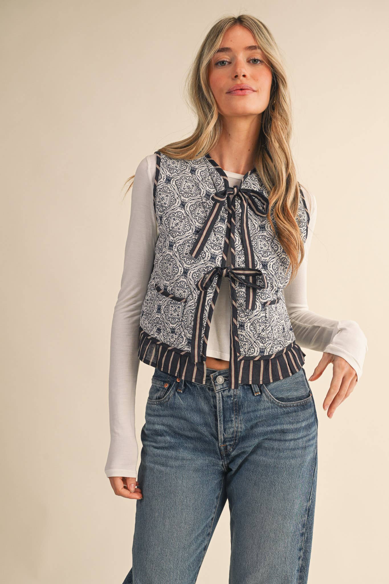 QUILTED PRINT RUFFLE TRIM VEST